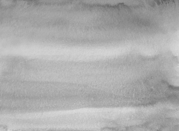 Watercolor neutral gray stains on paper background texture. Monochrome  overlay. Abstract aquarelle black and white modern painting.