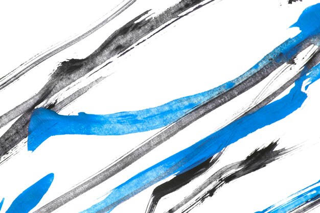 Photo watercolor paint abstract black and blue strokes on white background