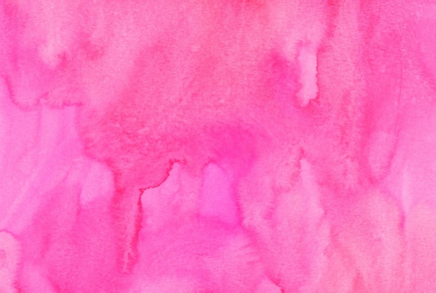 Watercolor pink background hand painted. Aquarelle bright pink stains on paper.