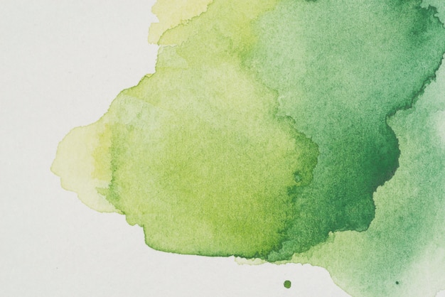 Watercolor stain of various shades of green