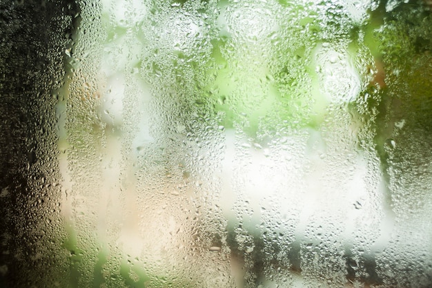 Waterdruppels op glas achtergrond bokeh aard.