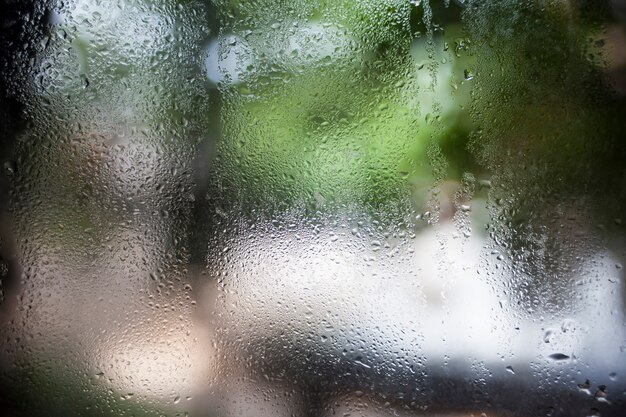 Waterdruppels op glas achtergrond bokeh aard.