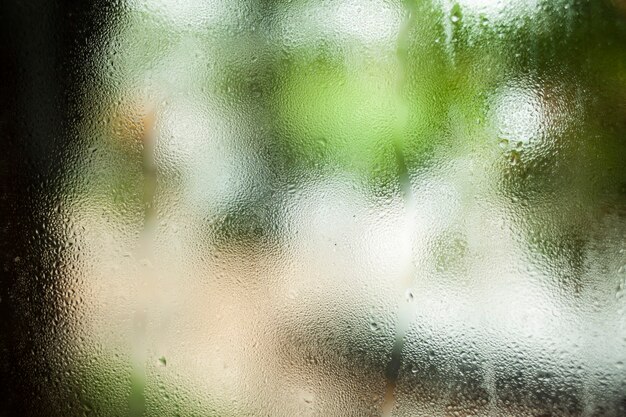 Waterdruppels op glas achtergrond bokeh aard.