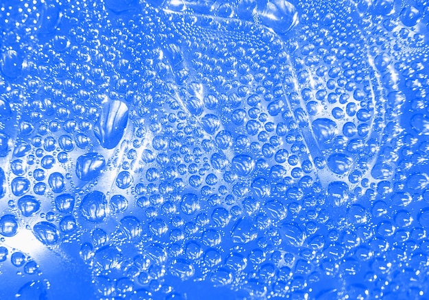 Waterdruppels op glas als abstracte achtergrond