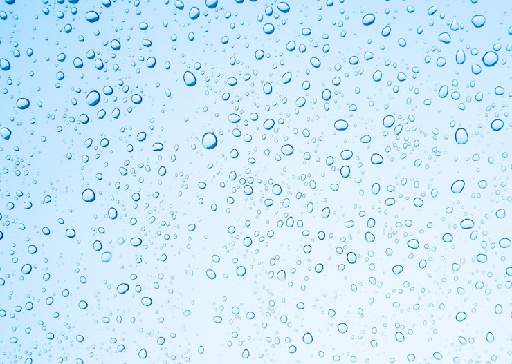 Waterdruppels op glas of regendruppel