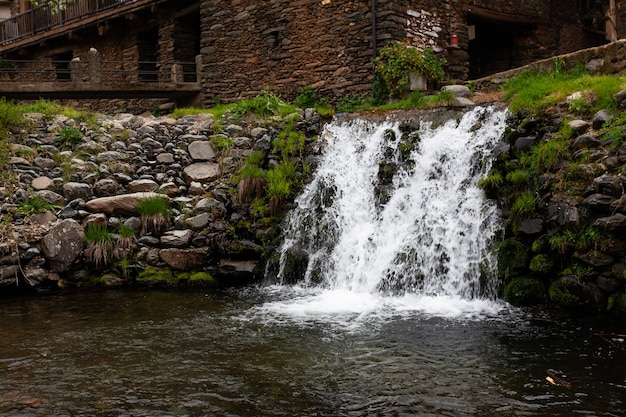 Waterfall on the Arrago river in Robledillo de Gata, Spain, the water falls wildly between granite rocks, movement