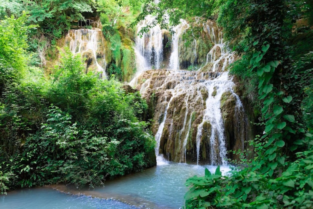 Waterfall cascade in the forest called Kroshuna waterfalls in Bulgaria