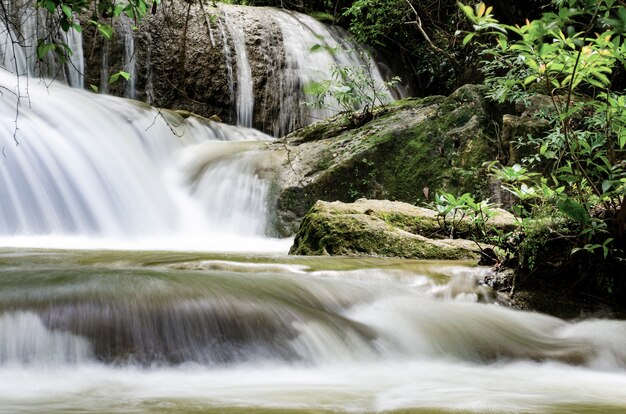 Waterfall flows through the rocks.