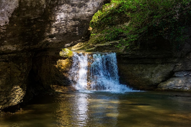 Waterfall on a forest stream in the foothills of Adygea