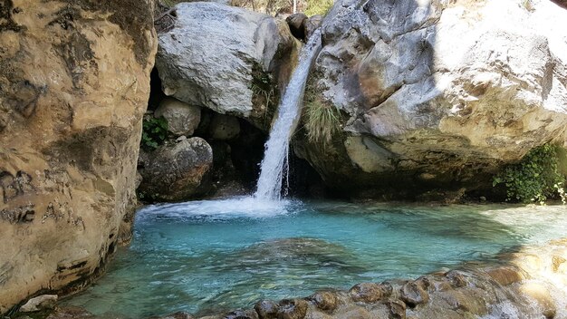 Waterfall in the Frigiliana river between mountains