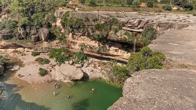 The waterfall of La Portellada of the river Tastavins tributary of Matarraa in Teruel Spain