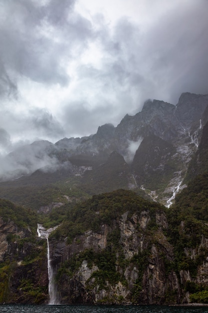 Waterfall at Milford Sound on a stormy day