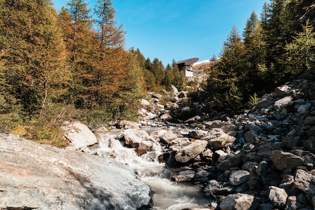 waterfall on mountain in Zermatt, Switzerland.