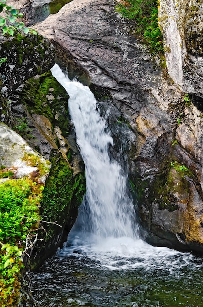 Waterfall on the river Zhigalan on a ridge Kvarkush in the north of the Ural mountains