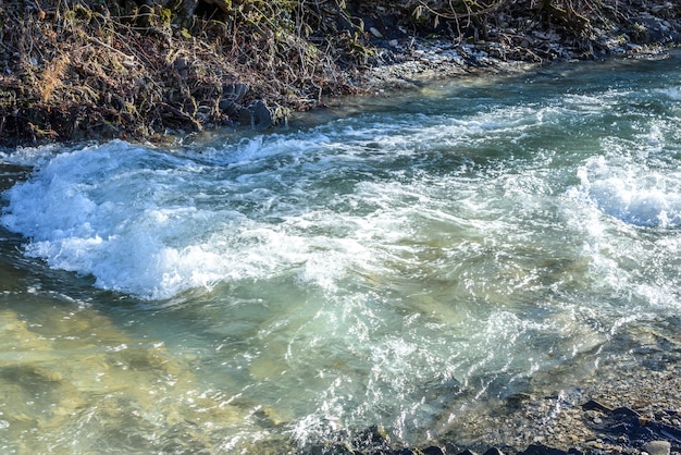 Photo waterfall on zhane river on sunny winter day krasnodar krai gelendzhik russia