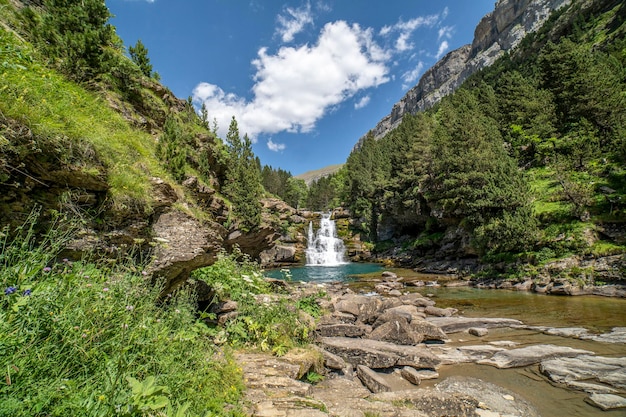 Waterfalls of the river Ara in the Ordesa valley on a sunny day Aragon Huesca Spain