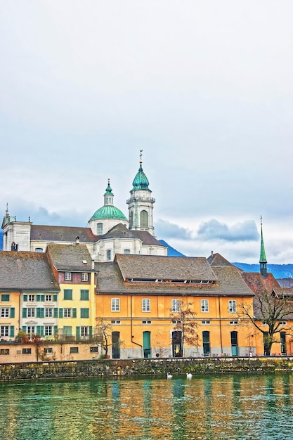 Waterfront and Saint Ursus Cathedral in Solothurn. Solothurn is the capital of Solothurn canton in Switzerland. It is located on the banks of Aare and on the foot of Weissenstein Jura mountains