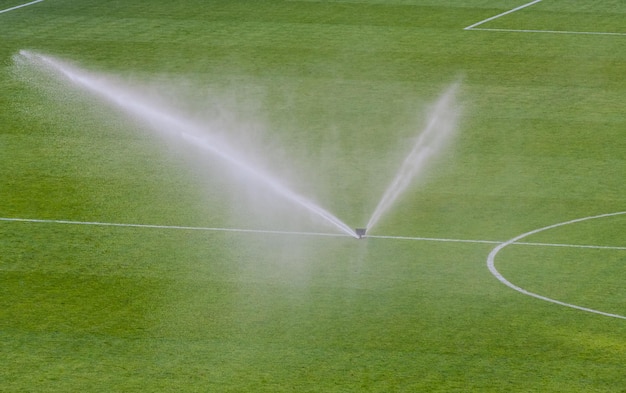 Watering turf on a football stadium