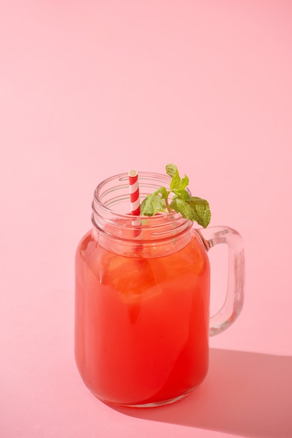 Watermelin jiuce on the pink background