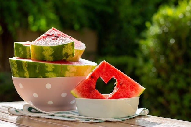 Watermelon berry Summer berry Watermelon backgroundJuicy red watermelon with carved heart Summer