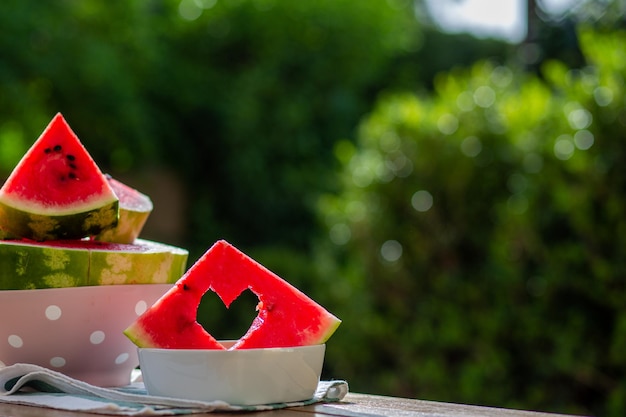 Watermelon berry Summer berry Watermelon backgroundJuicy red watermelon with carved heart Summer