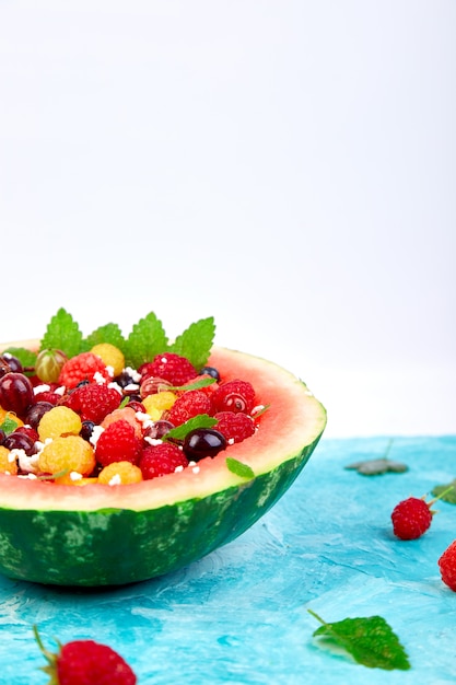 Watermelon bowl with cottage cheese and berries