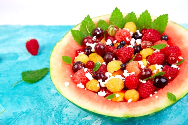Watermelon bowl with cottage cheese and berries
