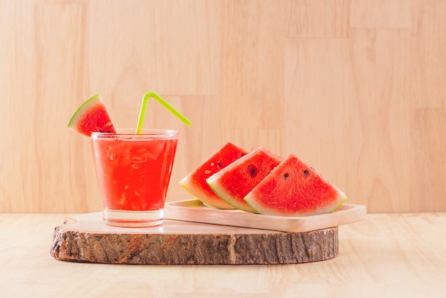 Watermelon drink in glasses with slices of watermelon in summertime