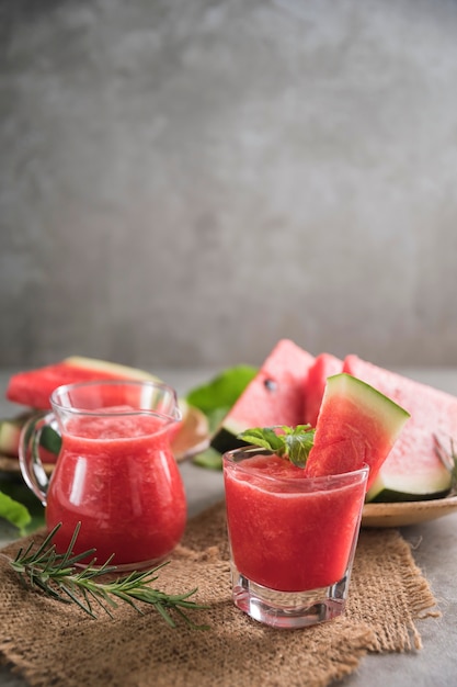 Watermelon drink in glasses with slices of watermelon