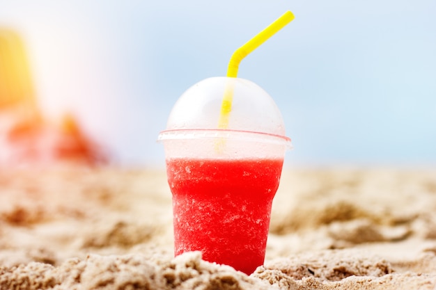 Watermelon fresh in plastic glass at the beach