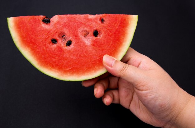 Watermelon fruit on black