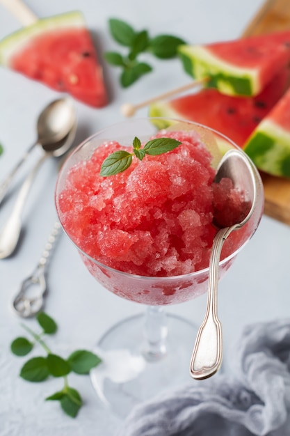 Watermelon granite with mint in a glass