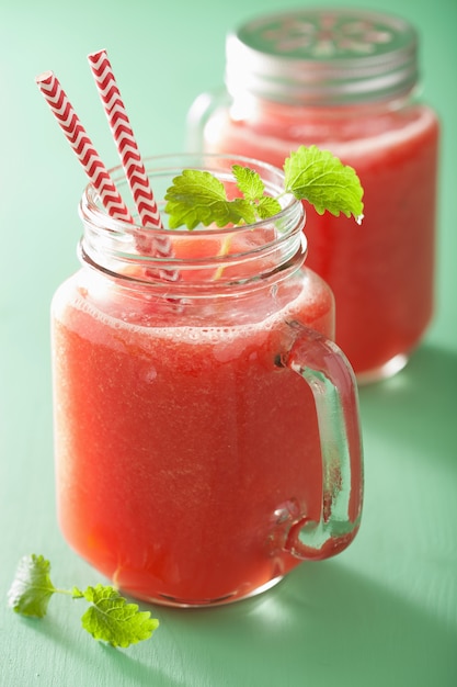 Watermelon lime smoothie in mason jars