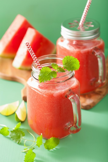 Watermelon lime smoothie in mason jars