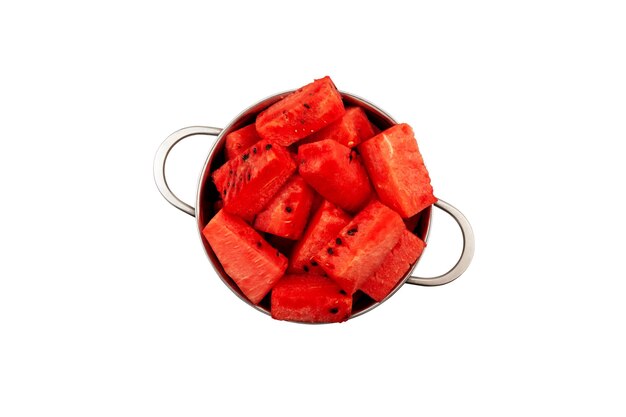 Watermelon pieces in metal pan isolated on white background top view Sugary watermelon cubes