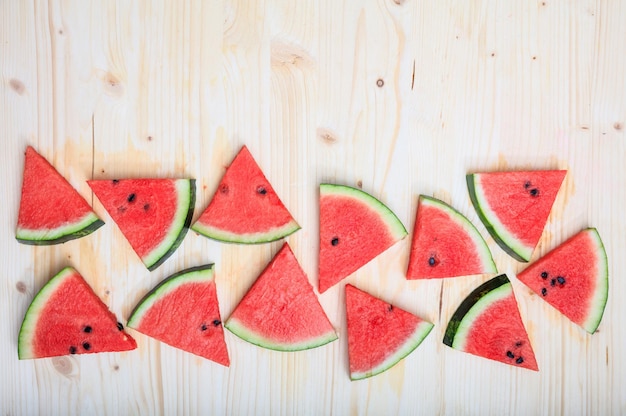 Watermelon pieces on a wooden board