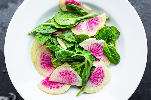 Watermelon radish salad chinese daikon diet vegan Slices pink fruit keto or paleo diet