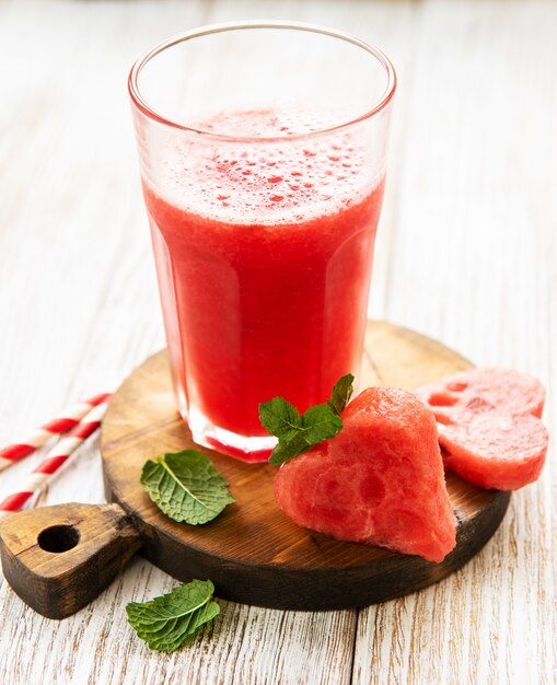 Watermelon smoothie and fresh watermelon