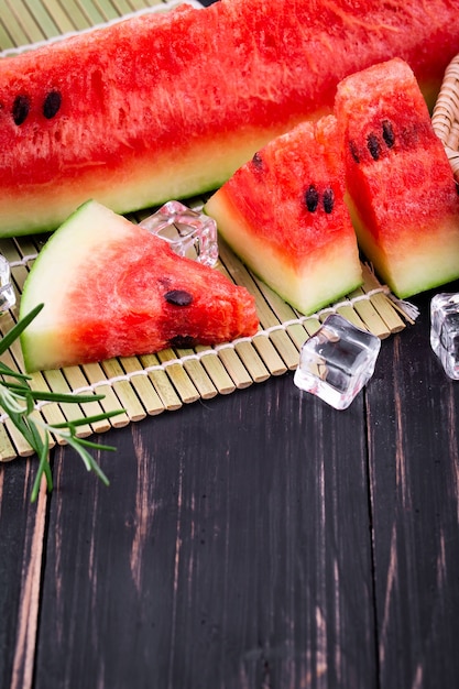 Watermelon on wooden background