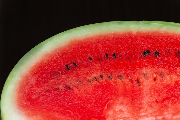 Watermelon on a wooden table top view