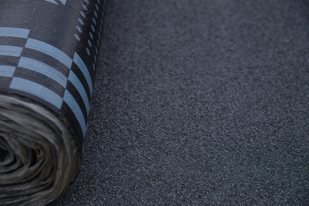 Waterproof bitumen roll covered with insulation materials