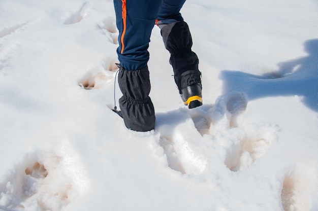 Waterproof boots for hiking, shoes in the water. Detail of men's climbing boots