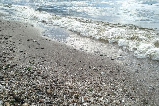 Foto onda sulla spiaggia