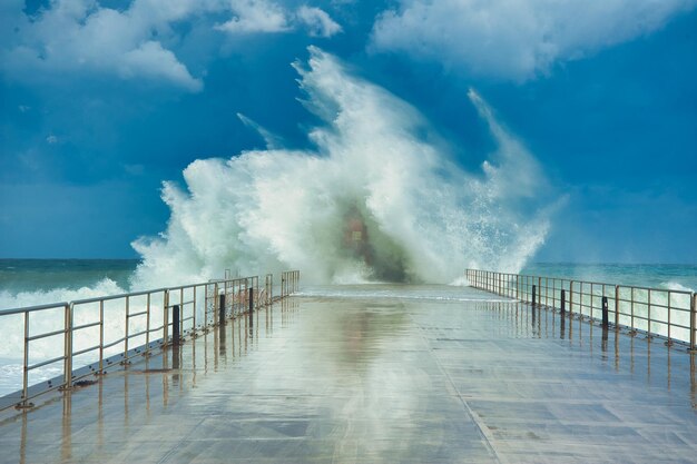 Wave breaking on the lighthouse