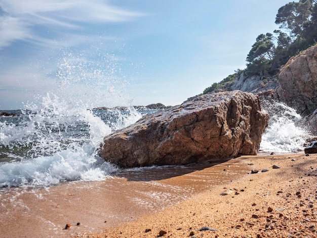 A wave smashing on a stone