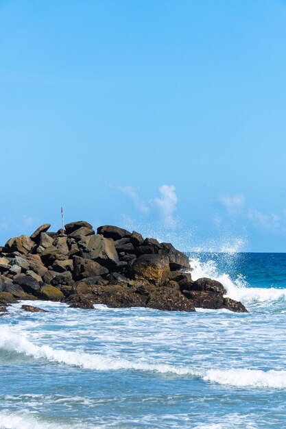 Waves crashing on a rock jetty in the ocean