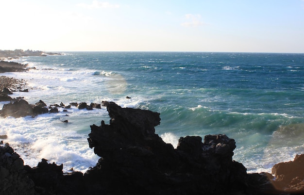 waves crashing on rocks