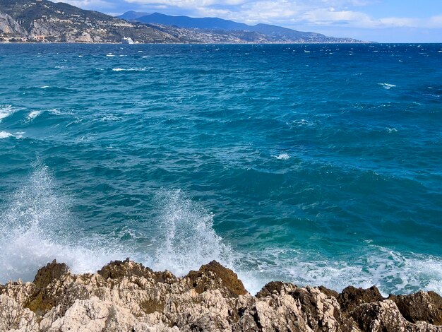 waves crashing on rocks