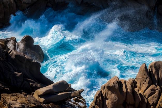 Waves Pounding the Coastline at Capo Testa