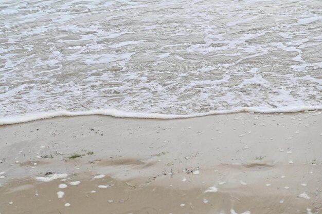 waves on the sand beach in Italy